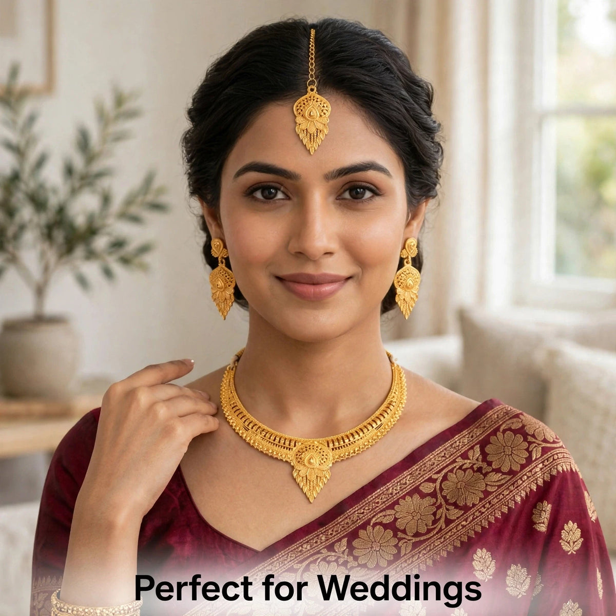 Model wearing gold plated haram set