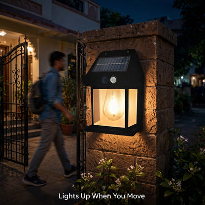 Lamp glowing at gate with motion
